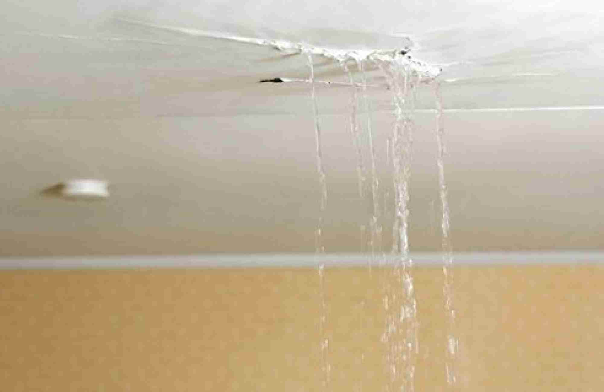 Water leaking from broken ceiling