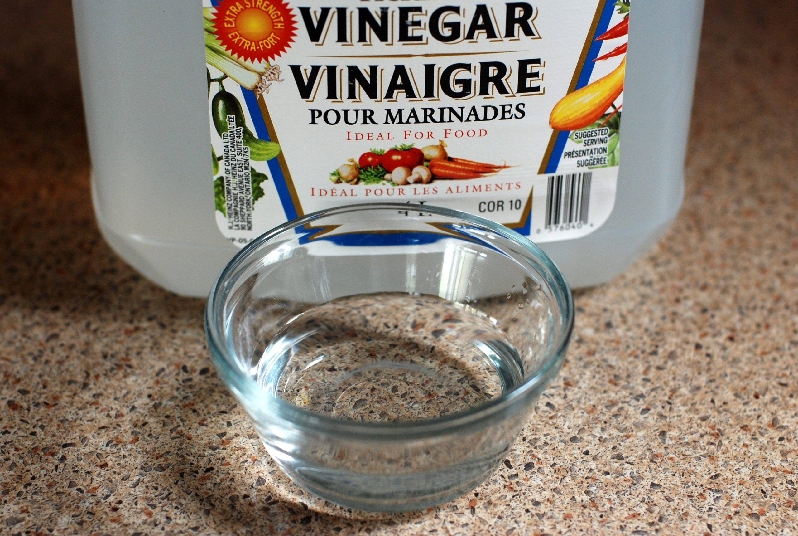 Vinegar and small transparent bowl