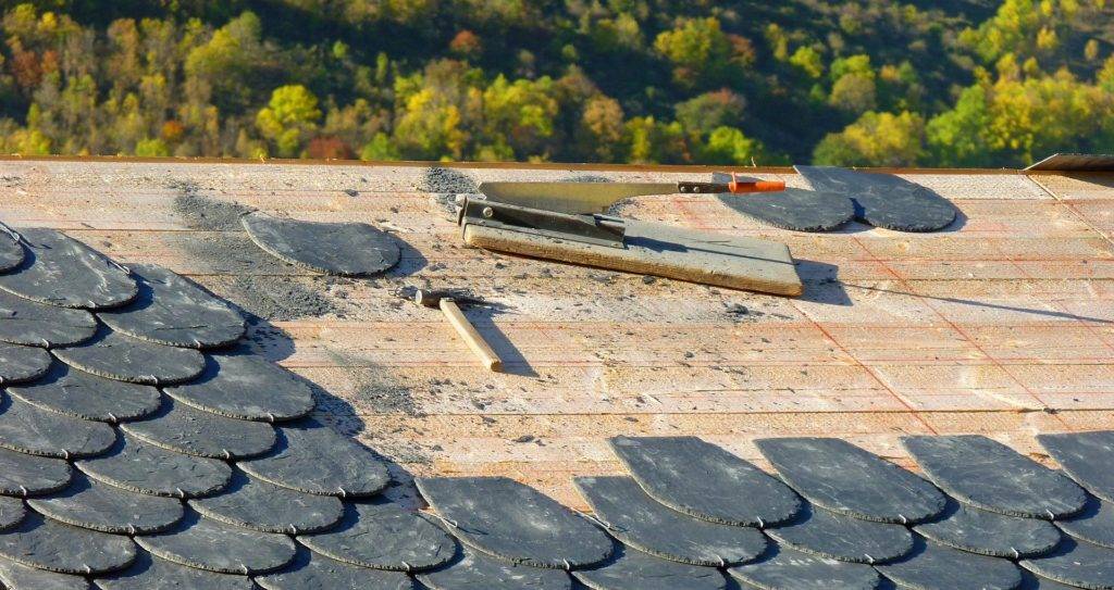 roof shingles being installed