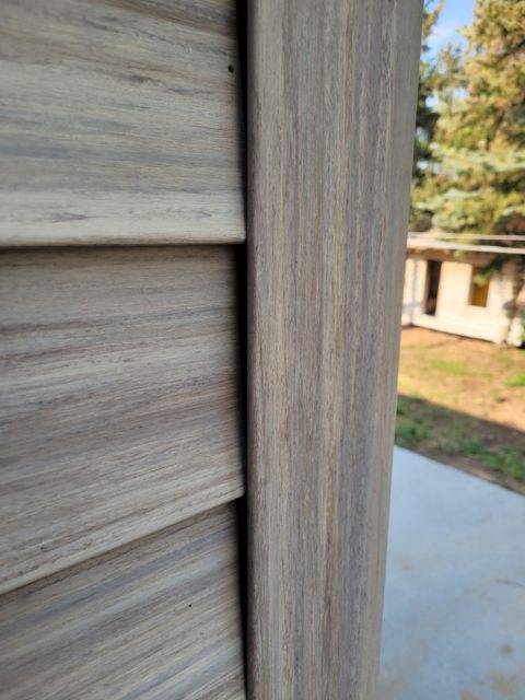 Closeup showing outside corner of vinyl siding.