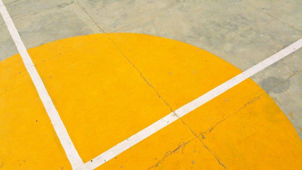 concrete painted yellow and white