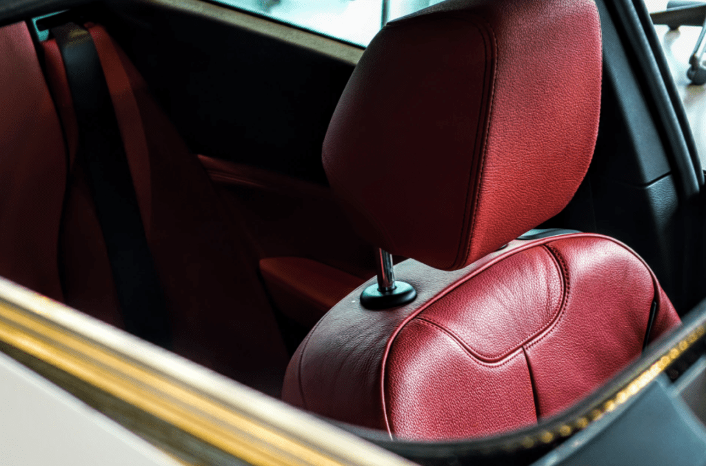 interior of a car with red leather seats