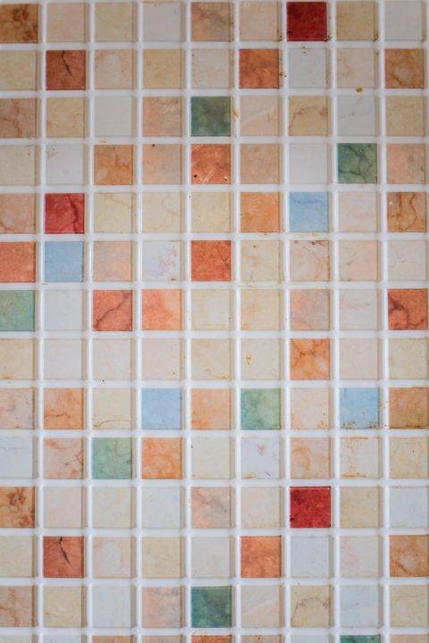 pastel backsplash tiles with white grout