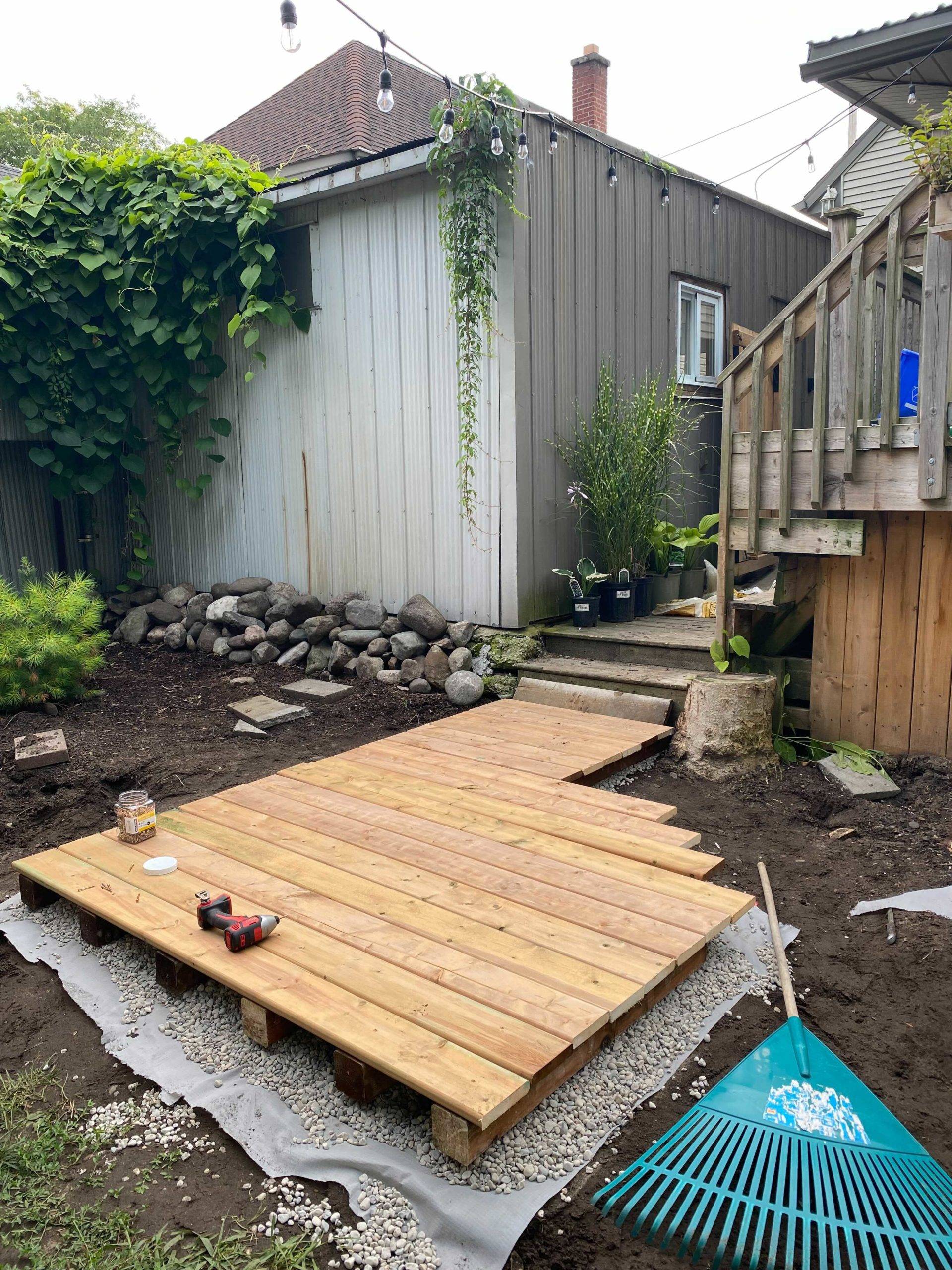 completely backyard boardwalk with saw resting on top