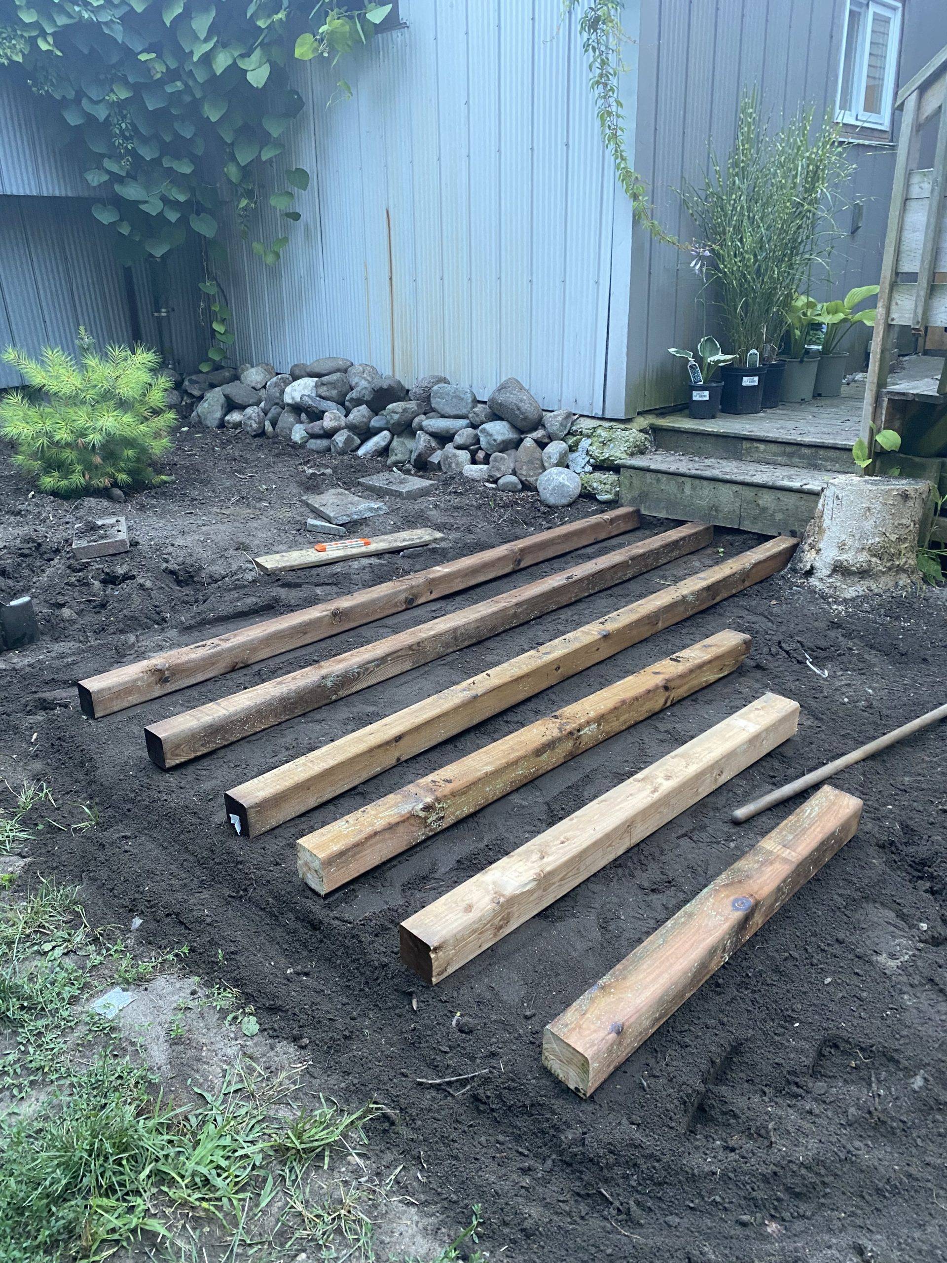 4x4s laid out on dirt 