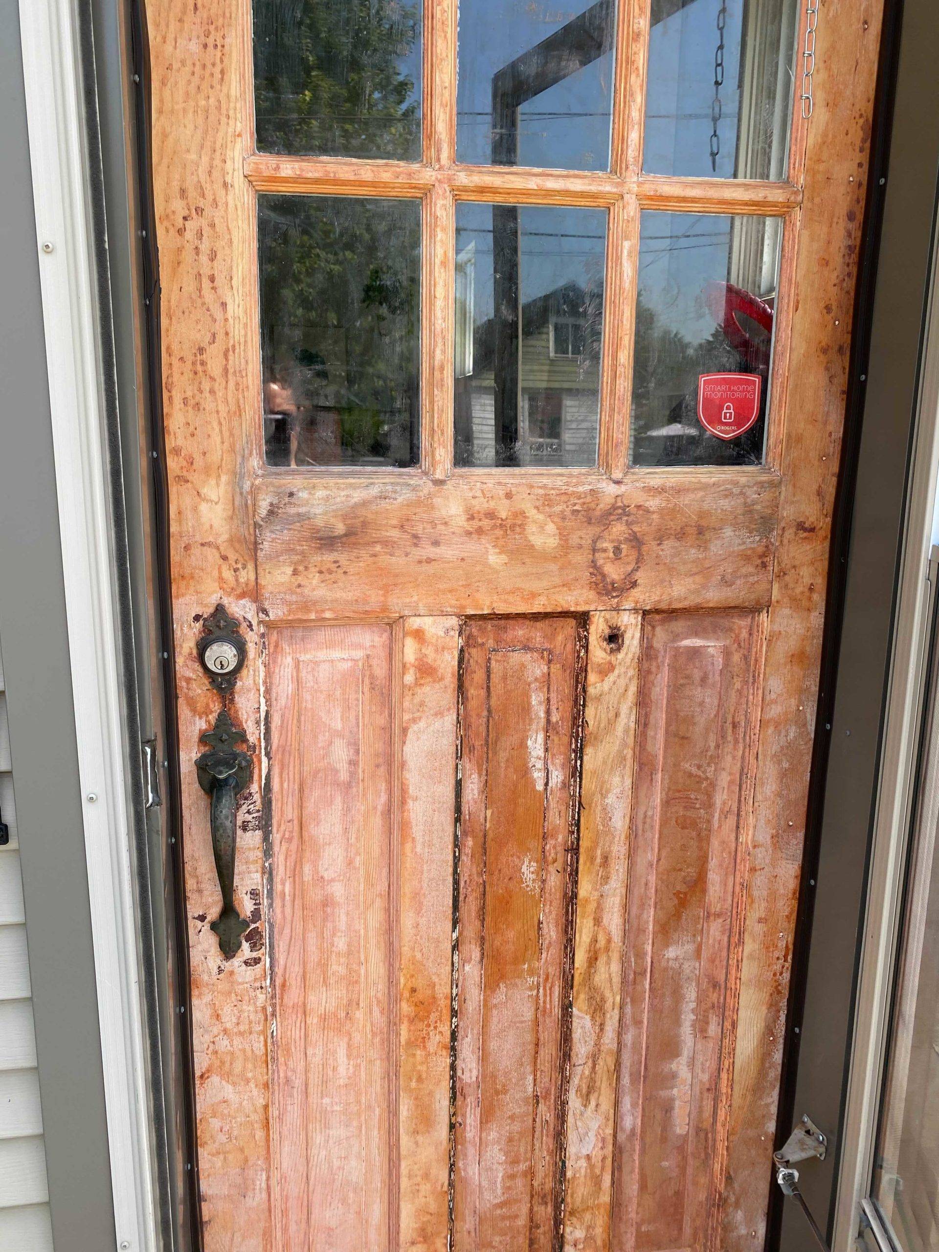 wooden door after being stripped of paint
