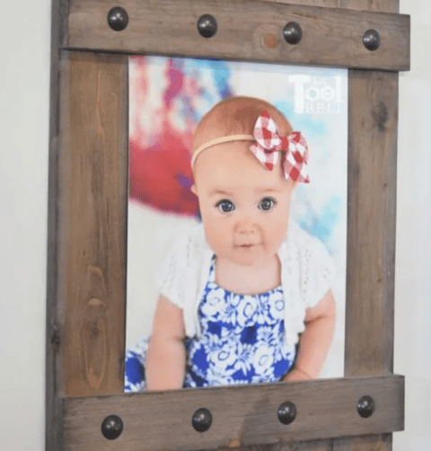 diy wooden picture frame with rivets