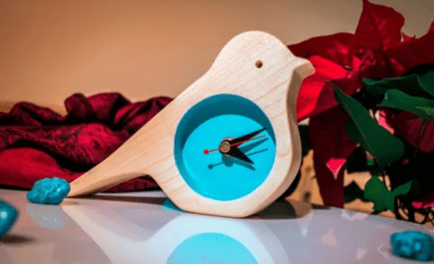 turquoise wooden bird clock