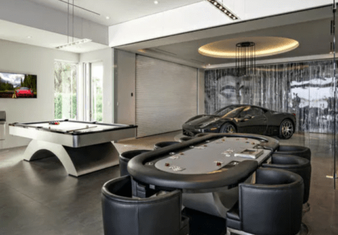 contemporary man cave with poker table and a car