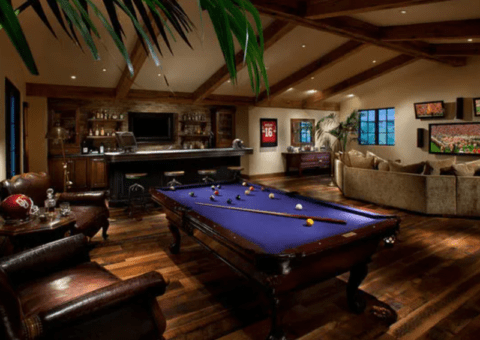 mediterranean themed man cave with pool table