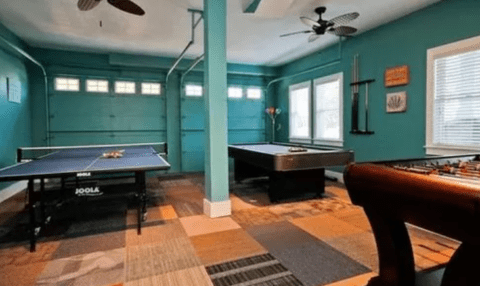 garage man cave with ping pong and pool table