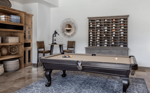 wine enthusiast man cave with pool table