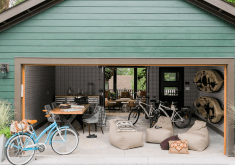 garage man cave with bikes and kayaks