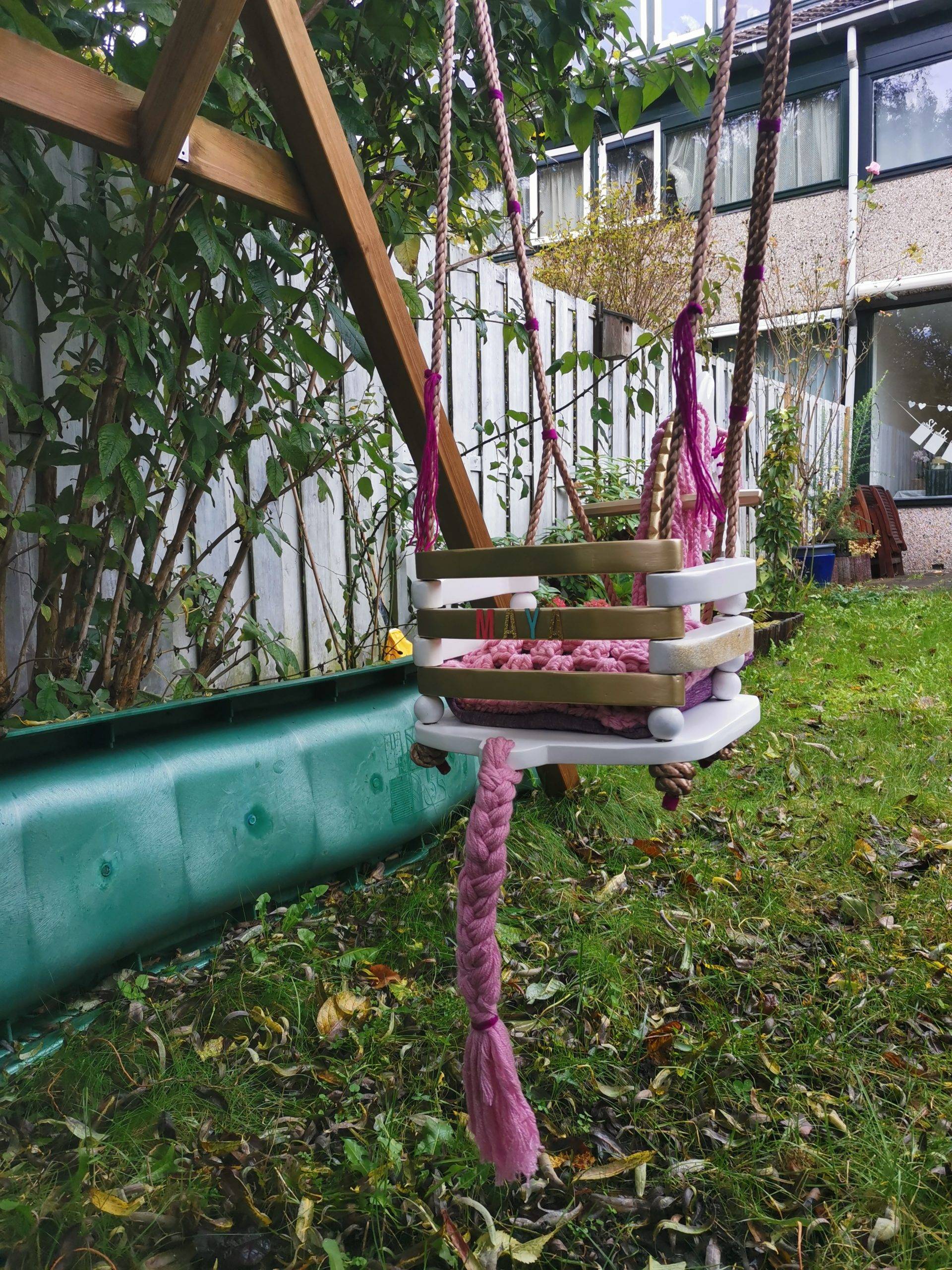 back view of unicorn swing