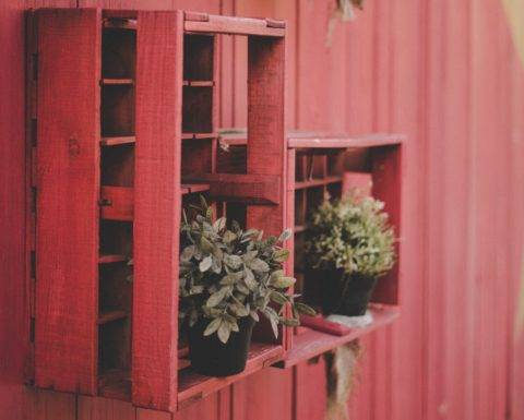 red hanging wood pallet planter