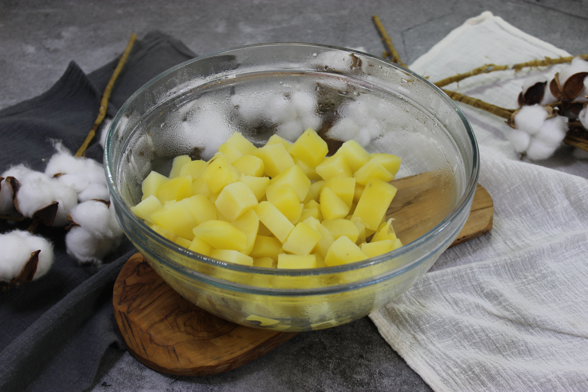 yellow potatoes chopped into clear mixing bowl