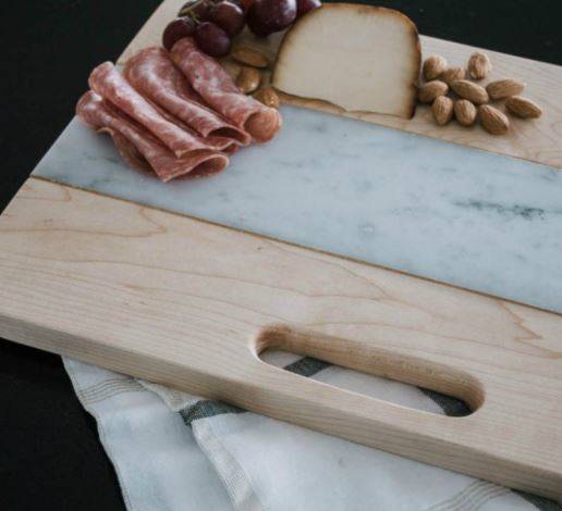 wooden cutting board with marble inlay