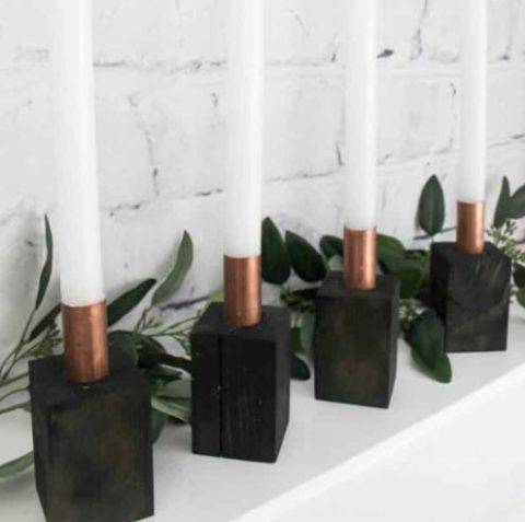 wood and copper candlestick holders
