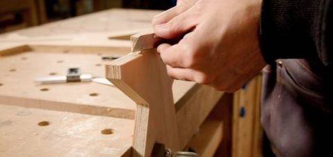 man joining two pieces of wood