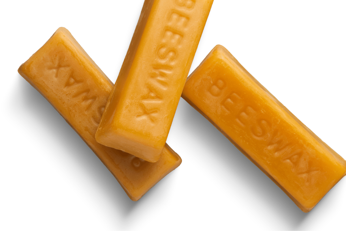 beeswax bars on white background