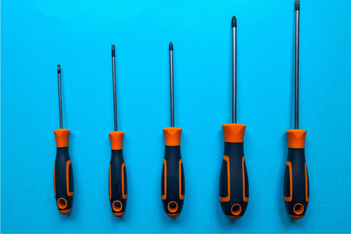 set of screwdrivers on blue background