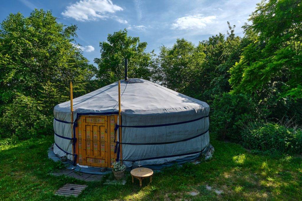 a ger among trees (traditional style yurt)