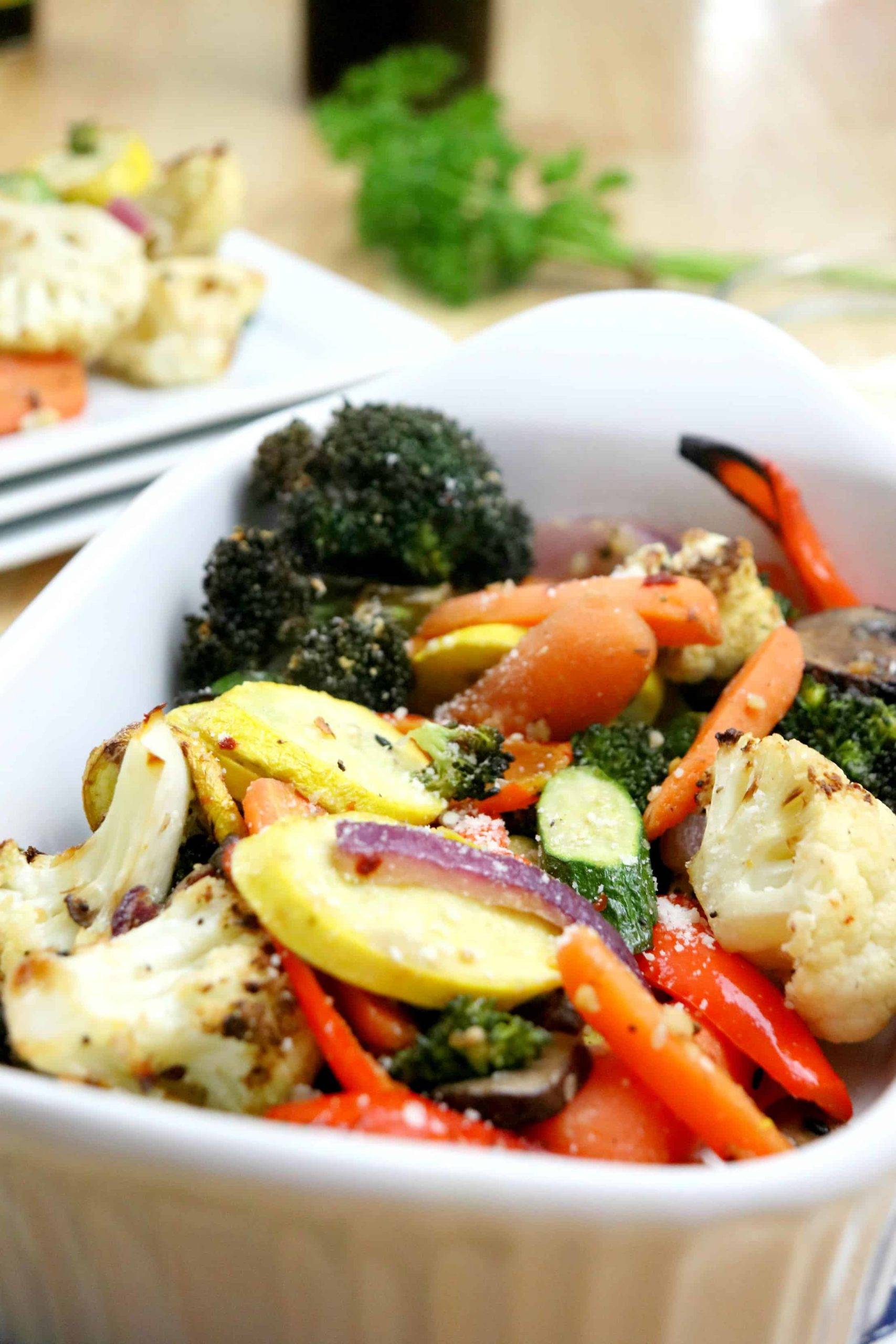 variety of colorful roasted vegetables in white bowl