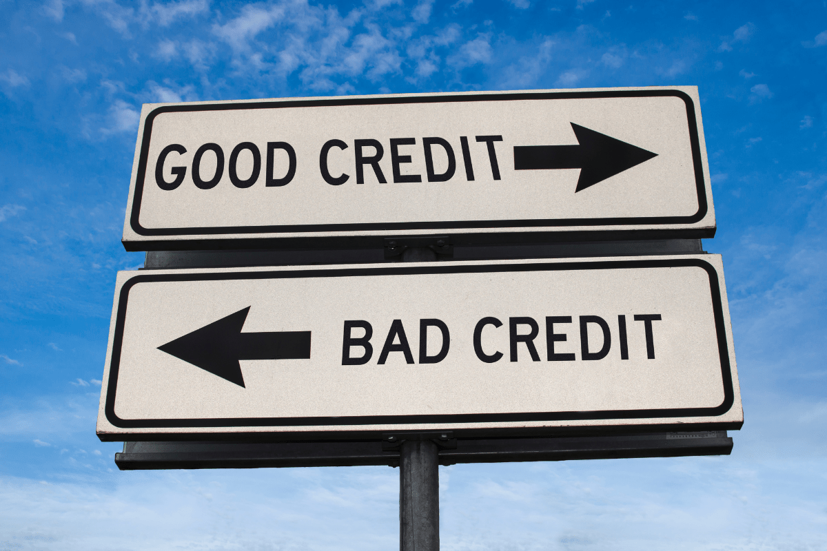 good credit bad credit signs on sky background arrows