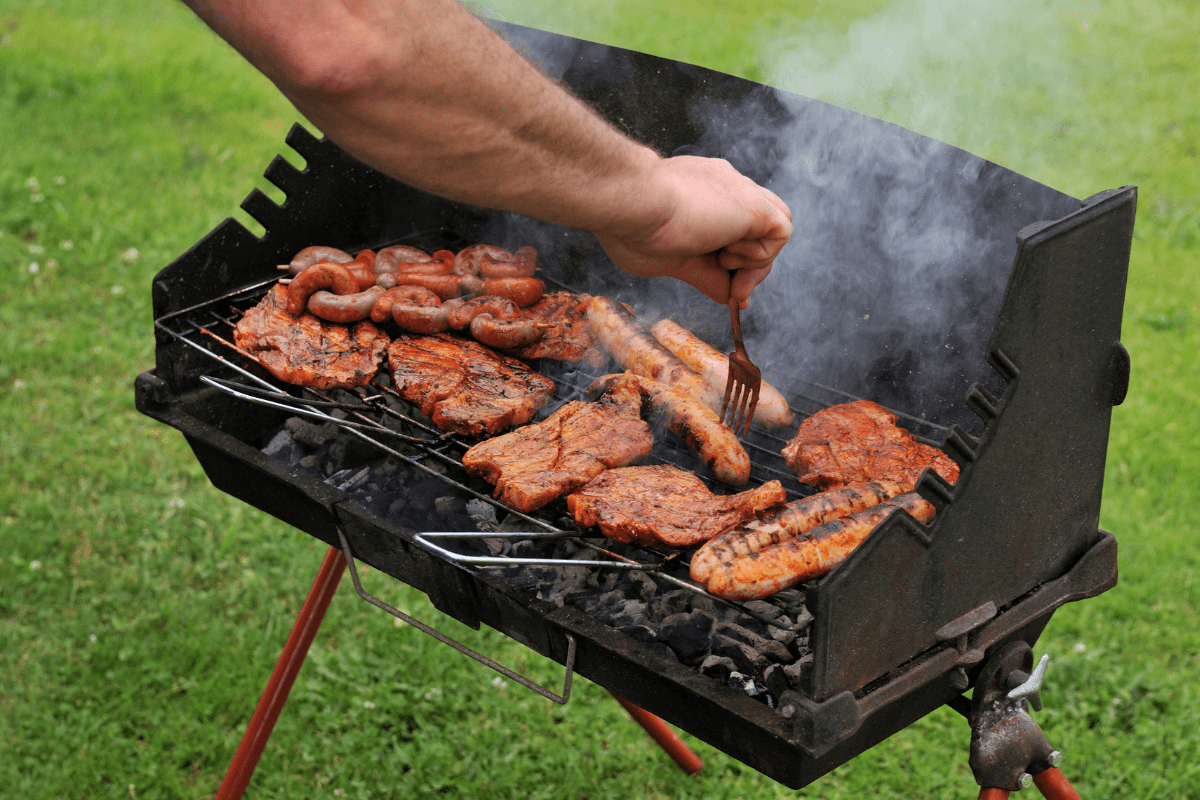 meat being cooked on a small grill