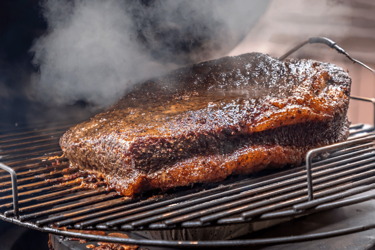 close up of piece of meat on a grill