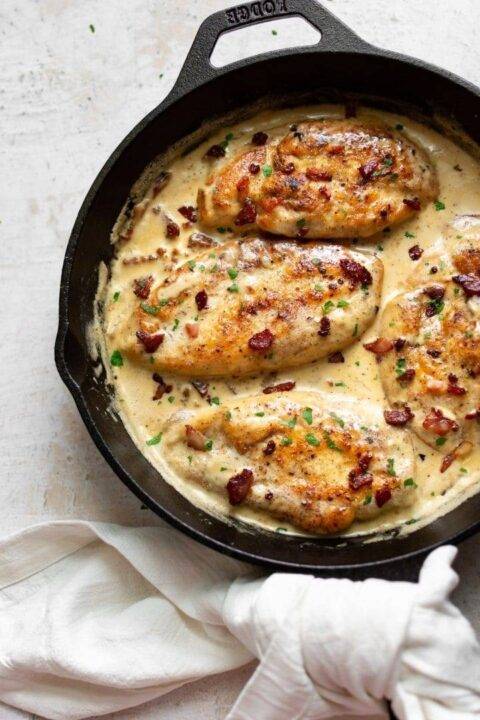 chicken bacon creamy sauce in iron skillet