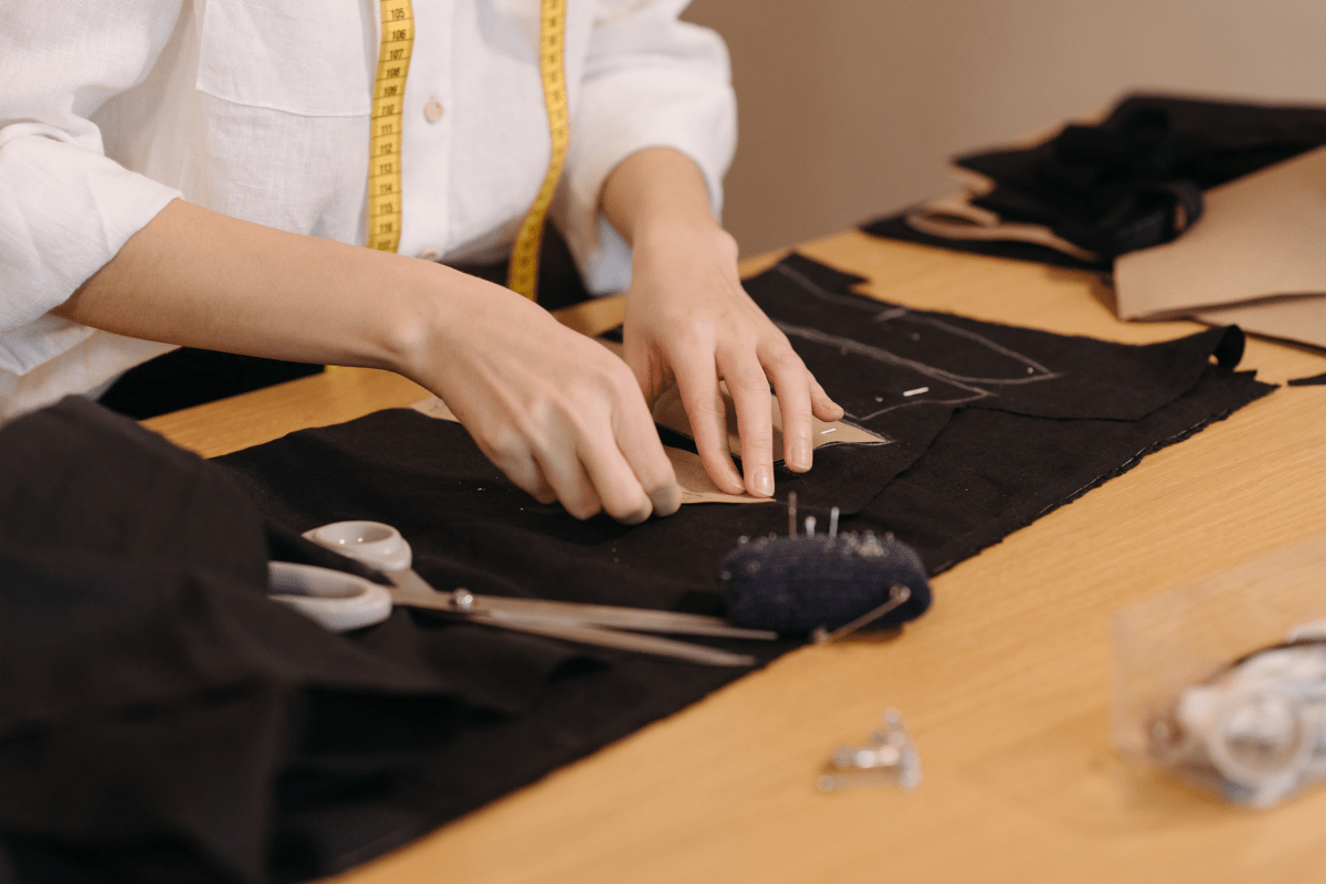 close up of a tailor with his tools