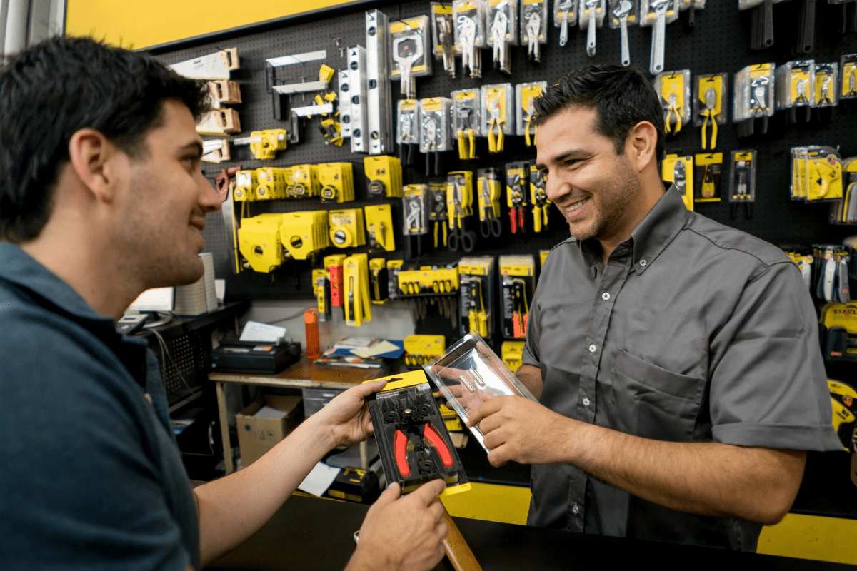 man talking to man at hardware store