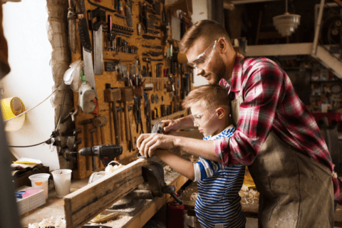 dad father and son woodworking together