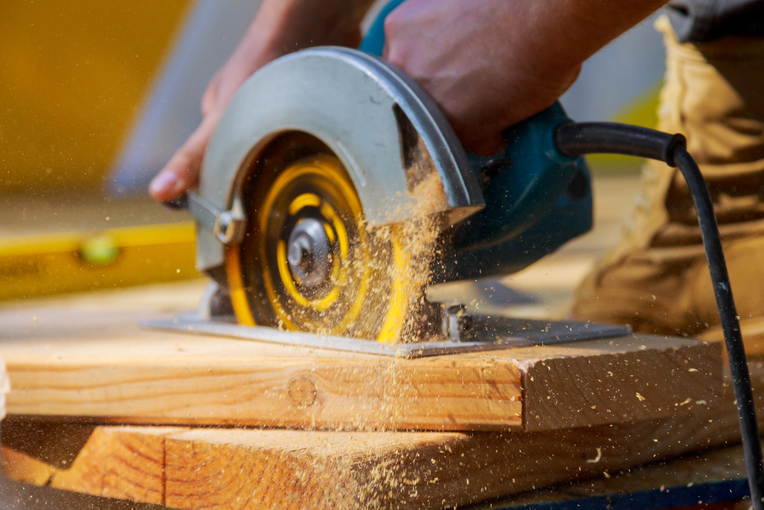 Power saw cutting through wood