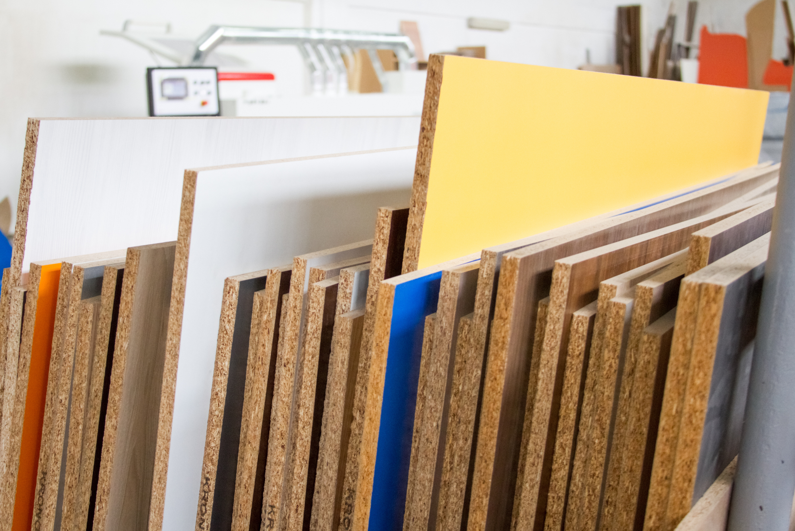 A selection of plywood boards in different colors.