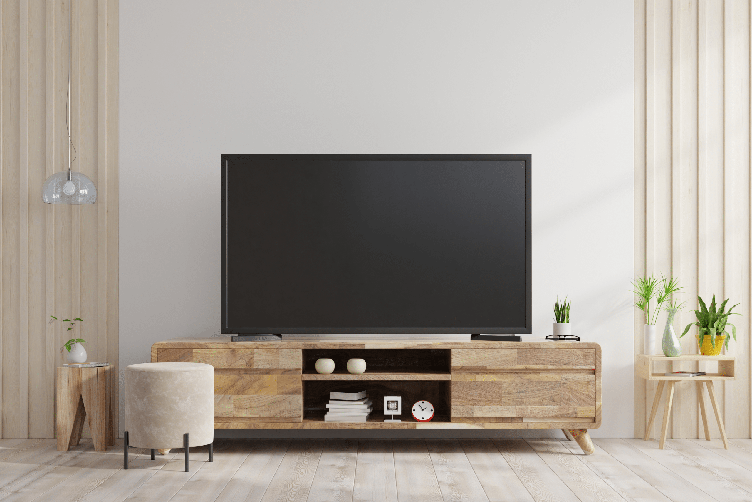 A modern living room with wooden TV stand.