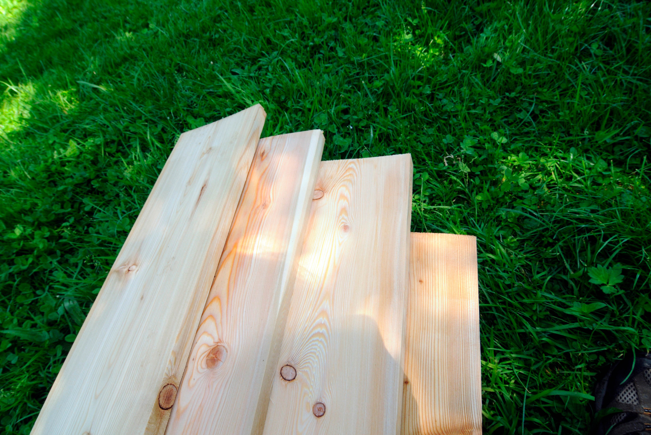 Wood boards on grass.
