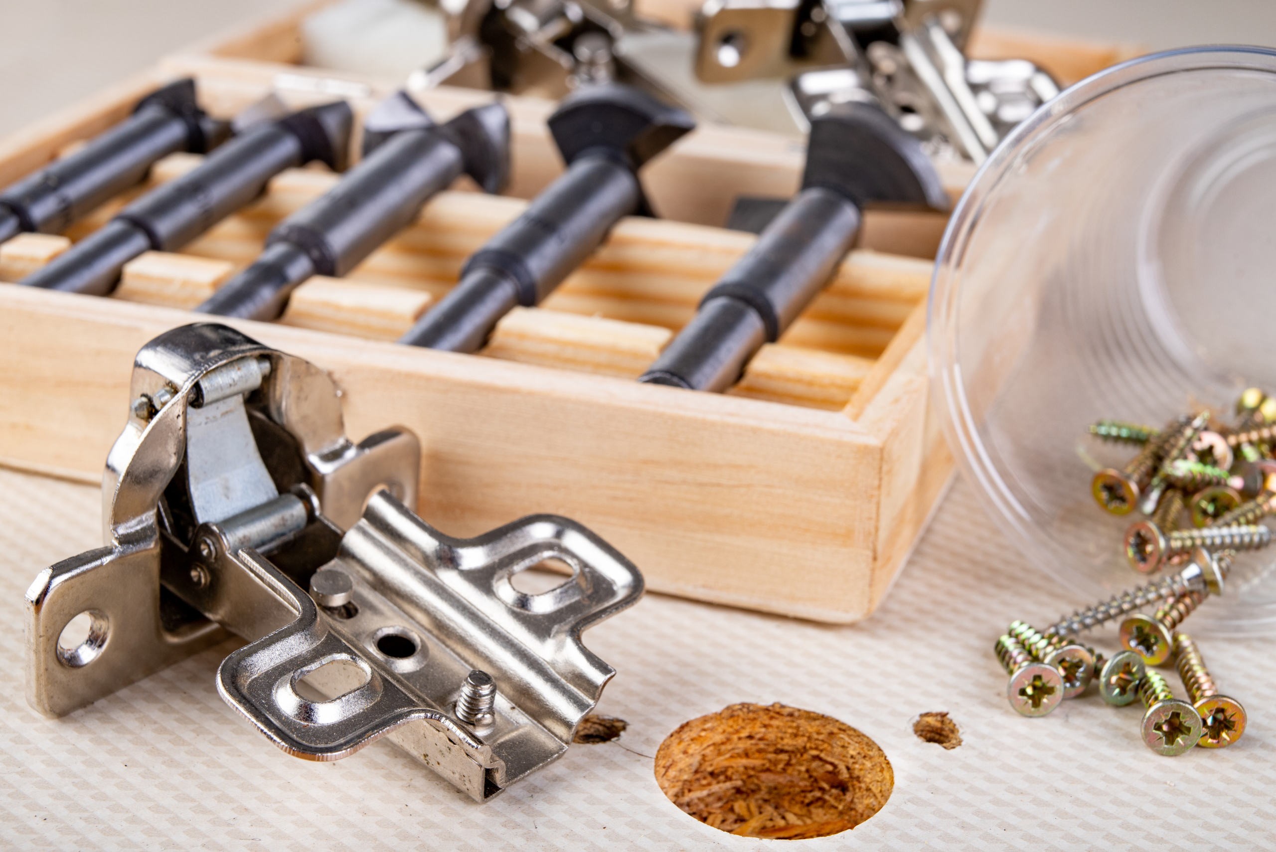 Assortment of cabinet hinges.