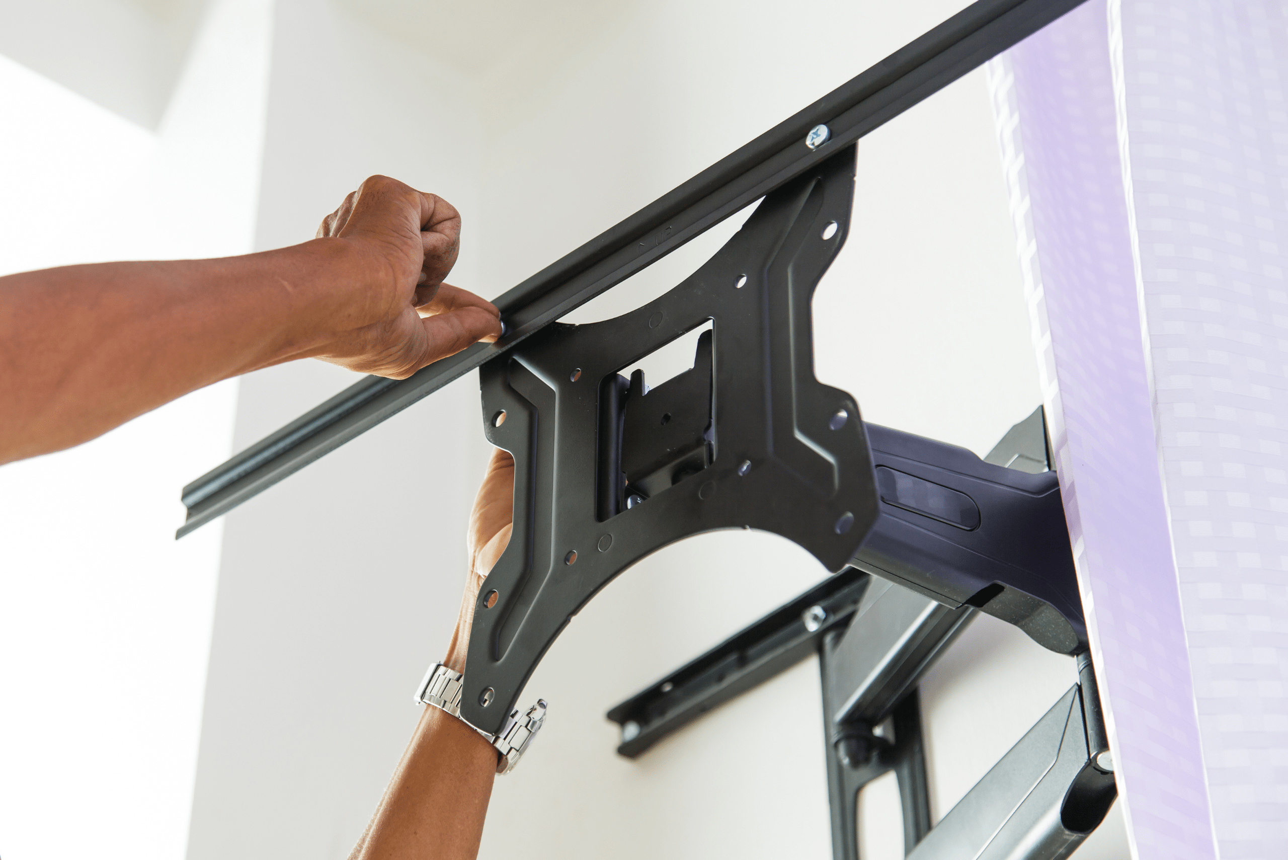 Using drywall anchors to mount TV.