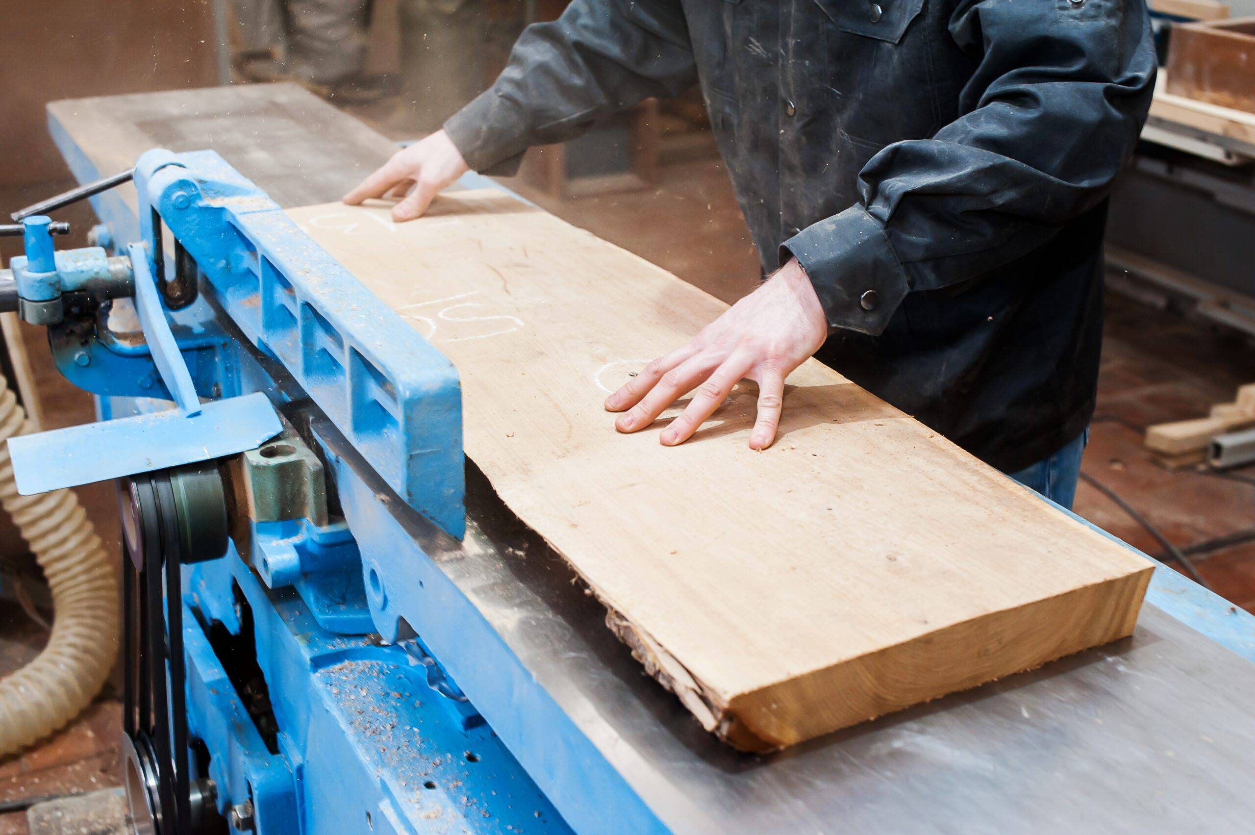 man using a jointer