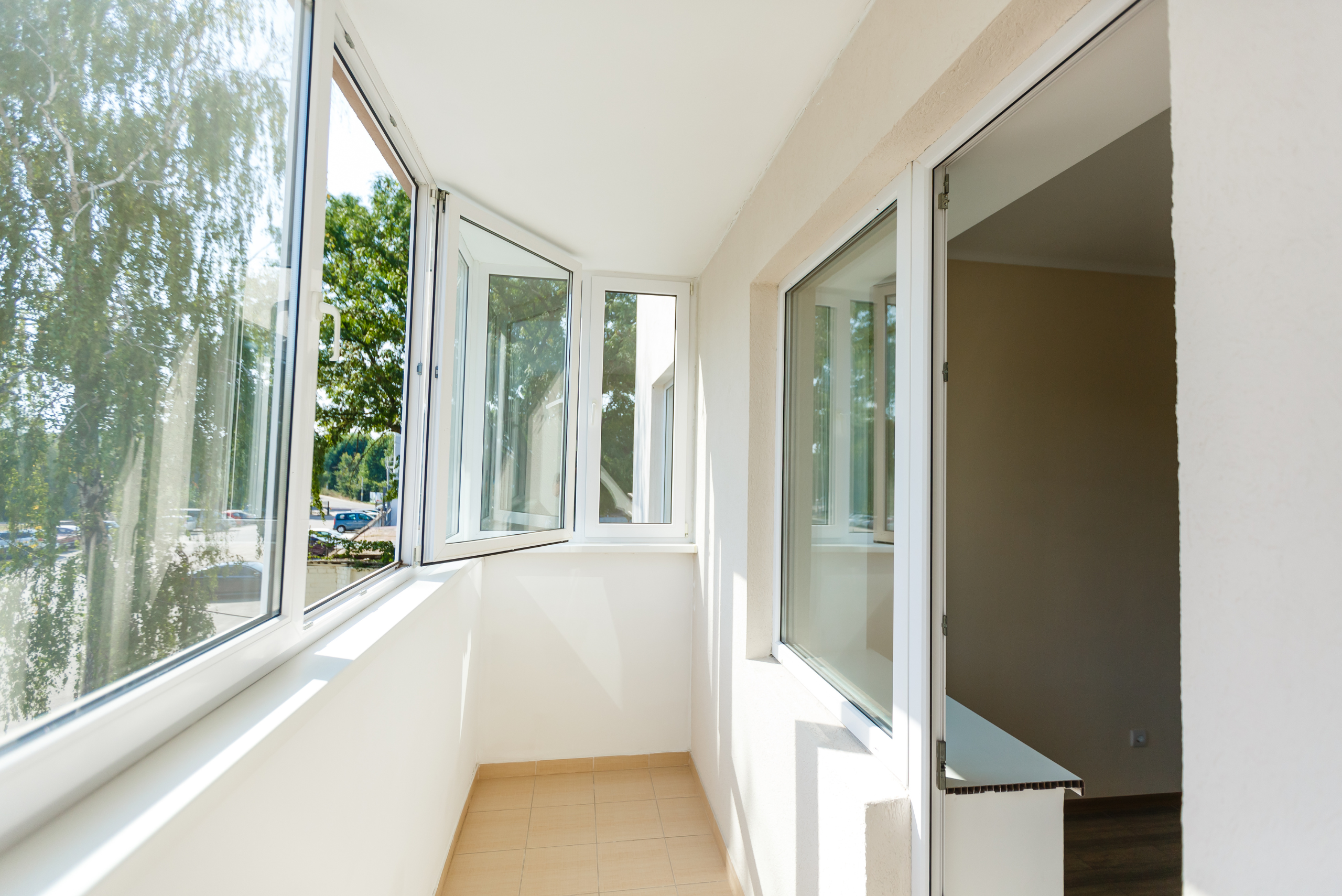 Open windows in a sunroom.