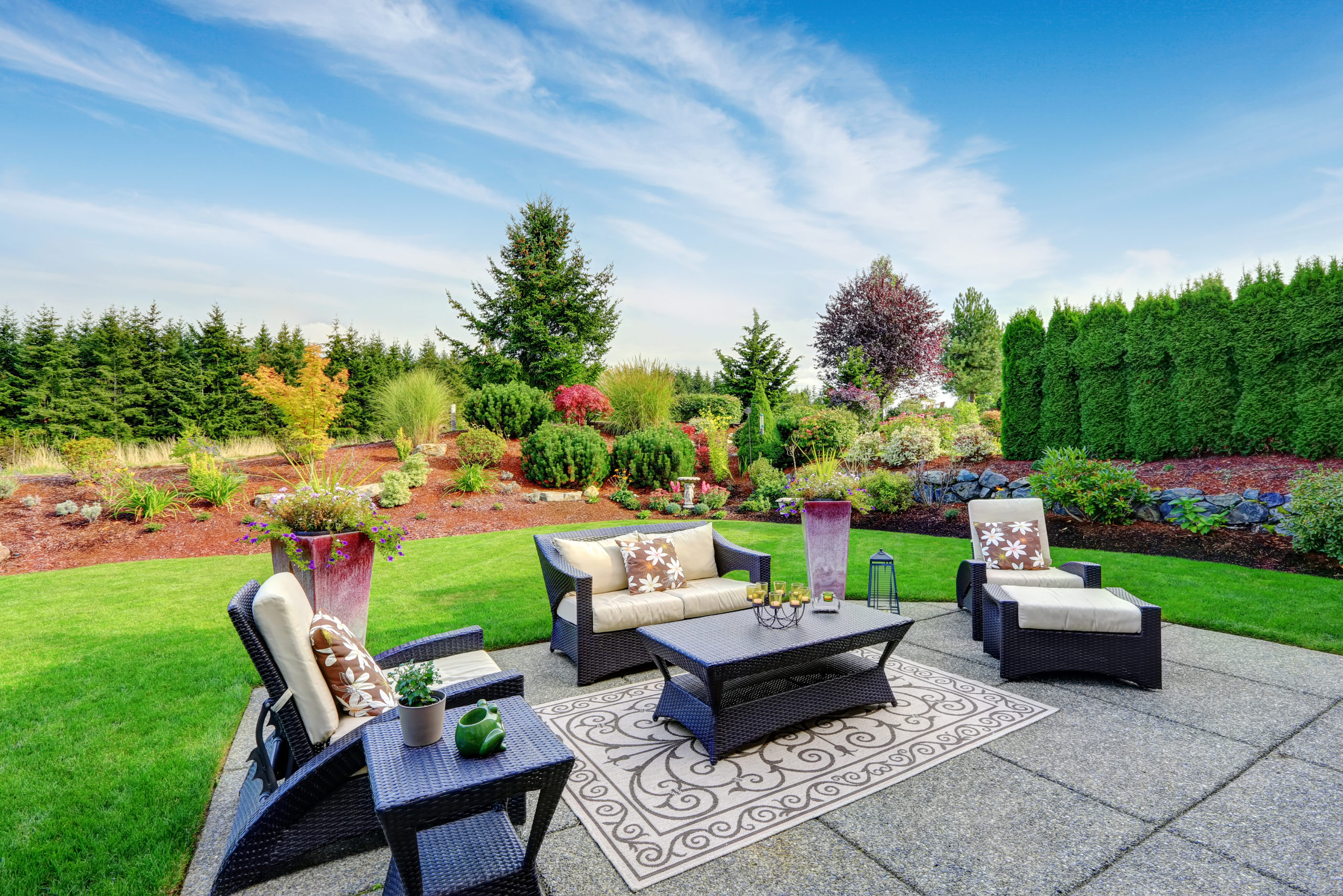 Backyard patio with concrete slaps.