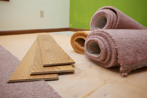 Carpet removed to prepare sub-floor for vinyl floor plan install.