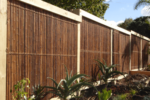 Bamboo fence with wooden frame.