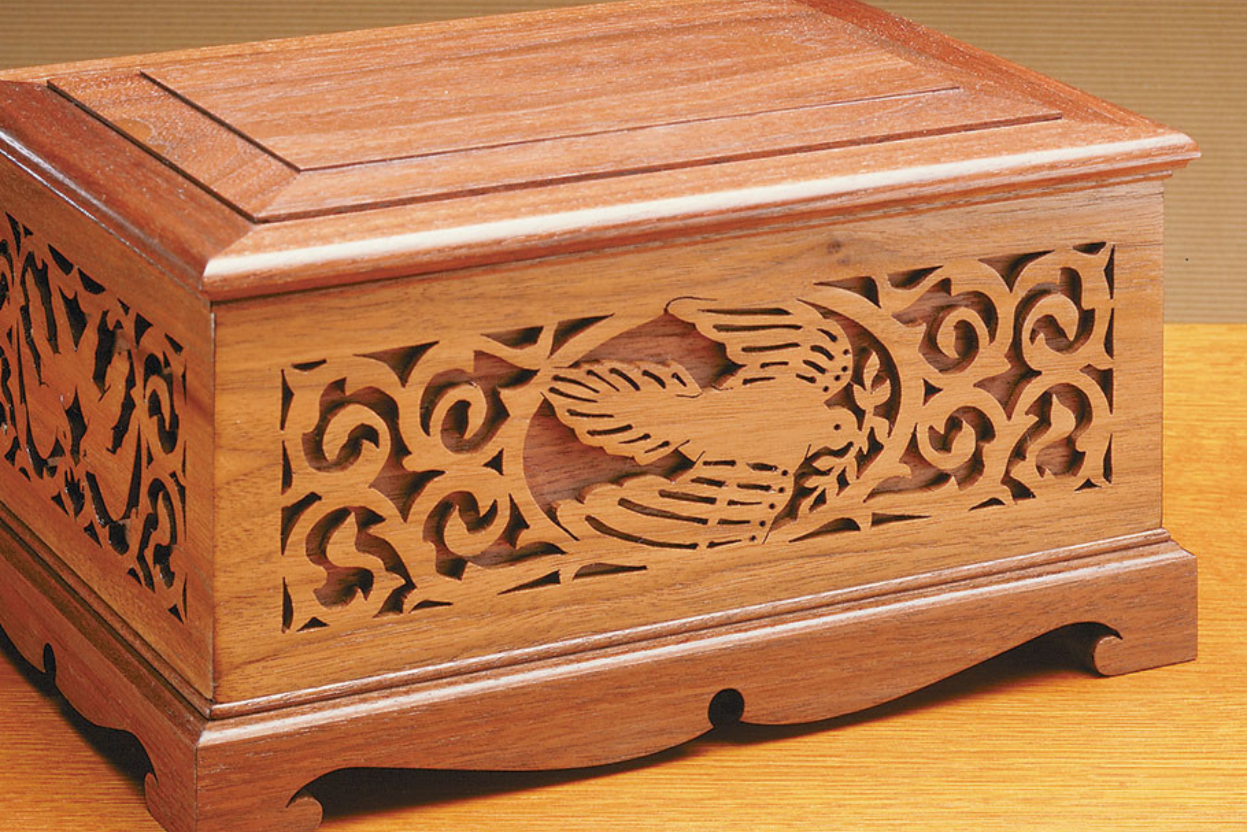 Wooden jewelry box made by a scroll saw.