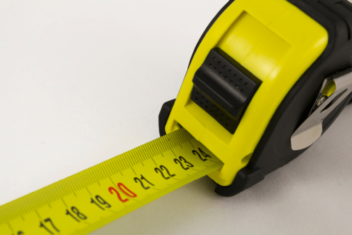 A measuring tape with red marks.