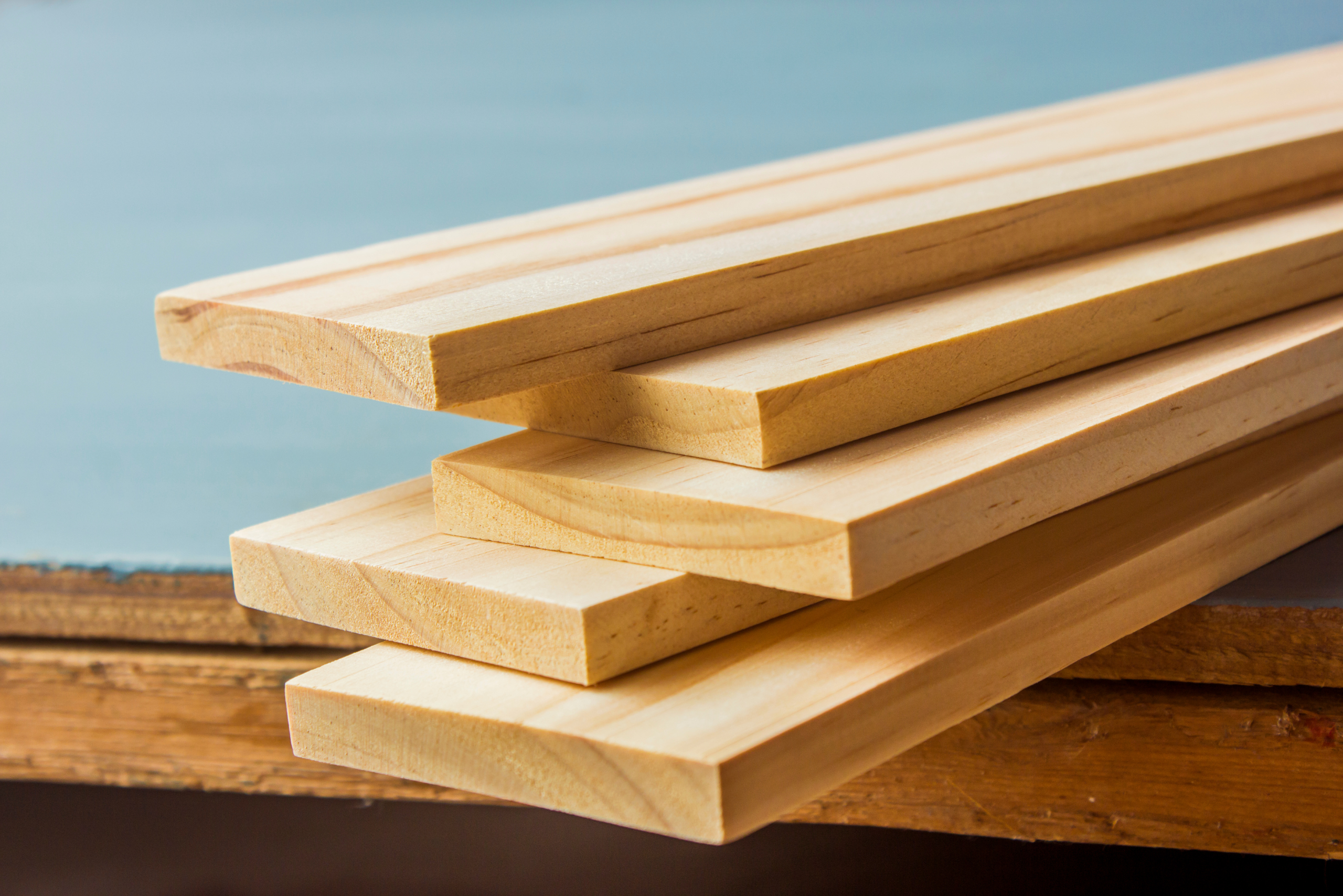 Wooden boards stacked on top of each other.