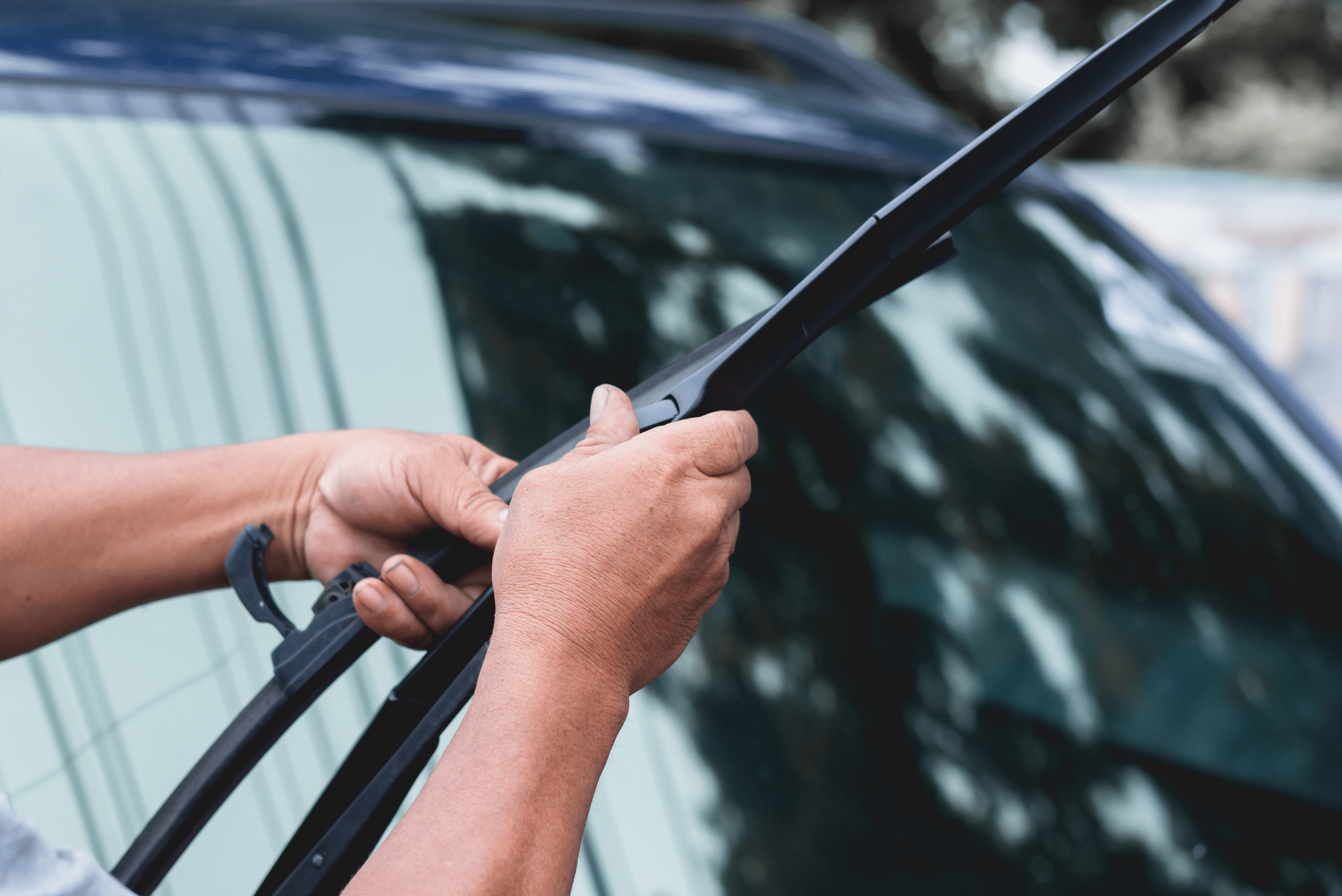 Wiper blade being slid out of the arm.