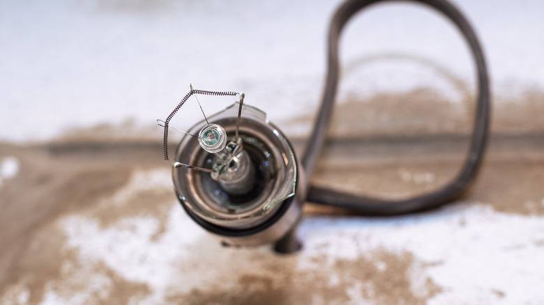 exploded light bulb in socket broken close up